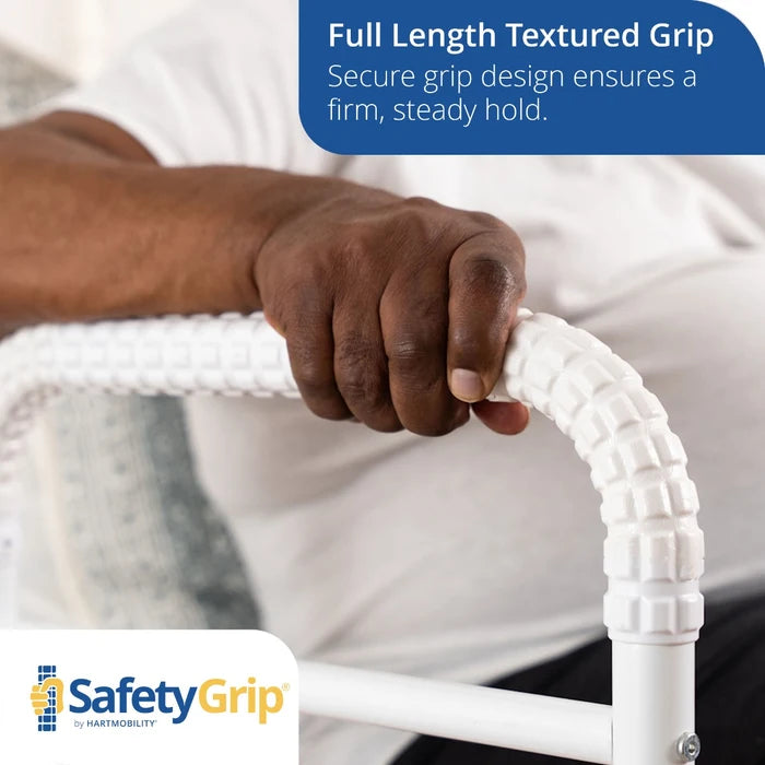 Hand holding a white textured grip with 'SafetyGrip' branding and text about secure grip design.