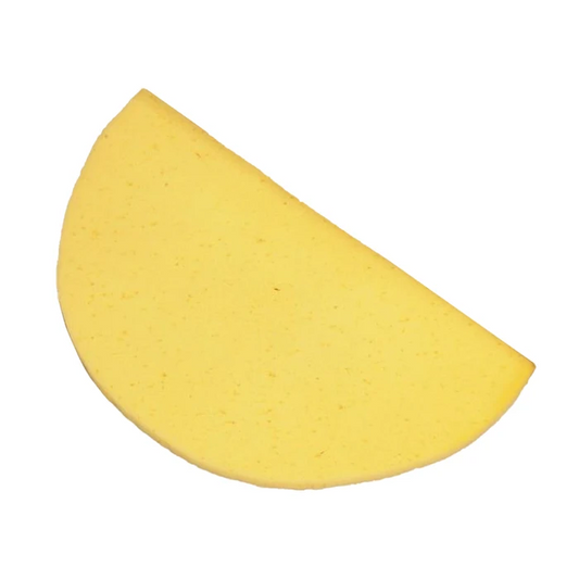 Yellow sponge bath mat on a white background