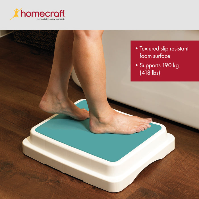 Step platform with textured slip-resistant foam surface, supporting 190 kg, on a wooden floor.