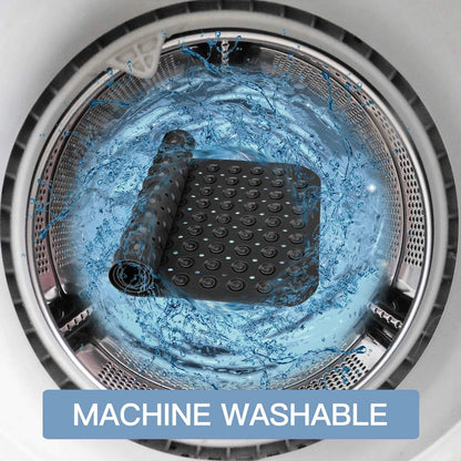 Black mat in a washing machine with water splashing around, labeled 'MACHINE WASHABLE'.


