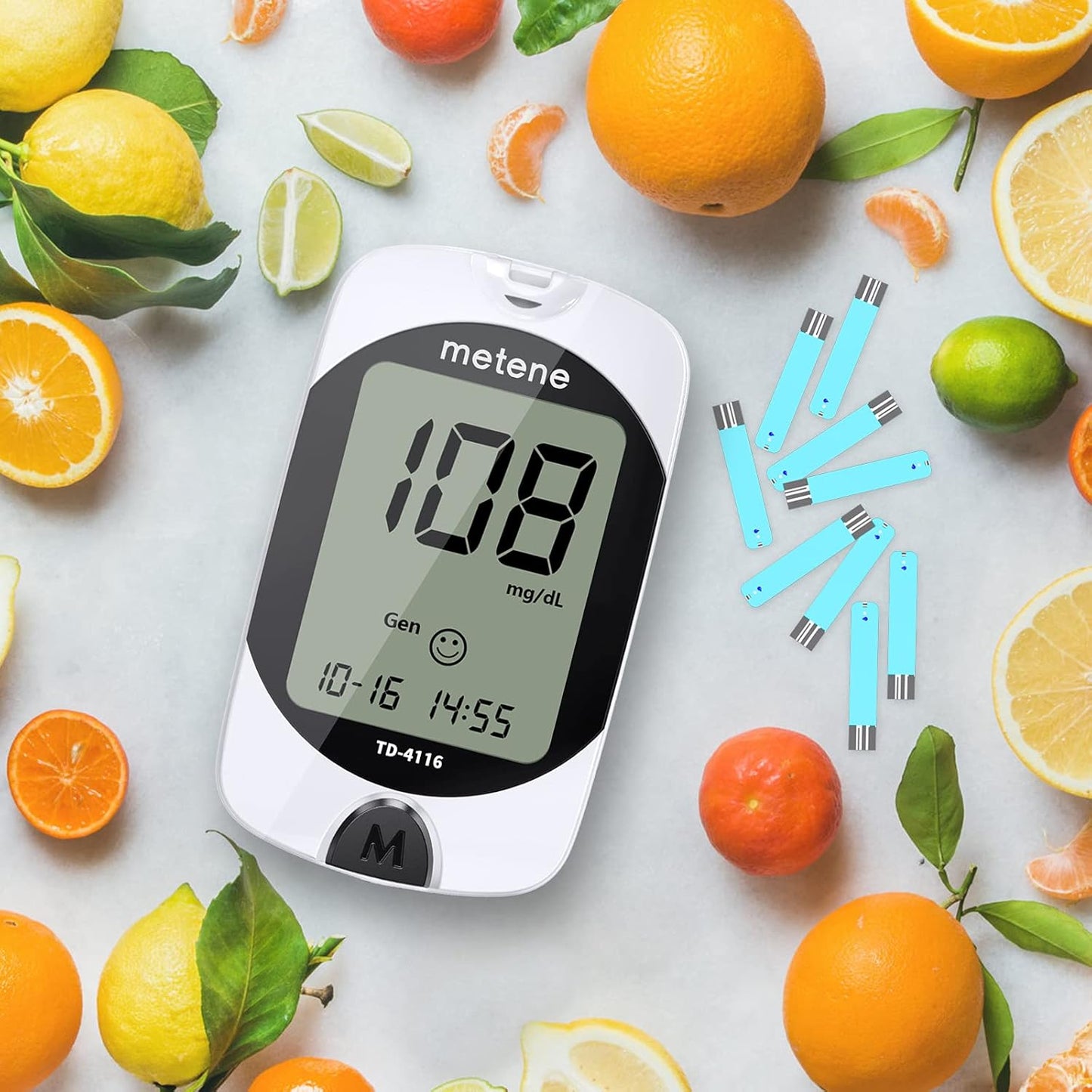 Metene blood glucose monitor with test strips and fruits on a light background
