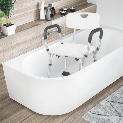 Bath tub with a shower seat and grab bars in a bathroom setting.

