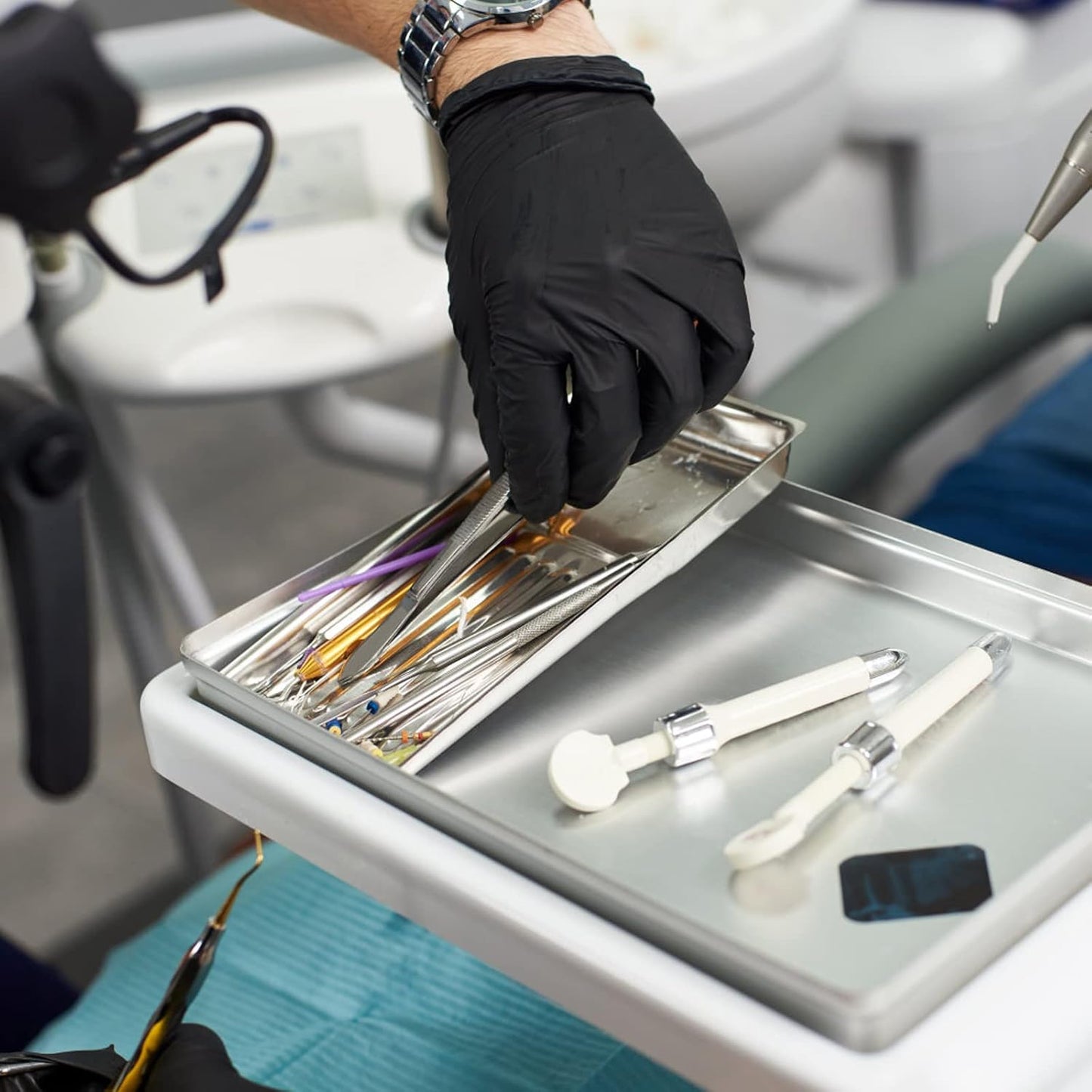 Hands wearing GMG black nitrile gloves. Ideal for medical exams, food prep, and cleaning tasks.