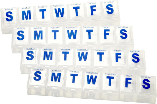 Set of white pill organizers with blue letters indicating days of the week.

