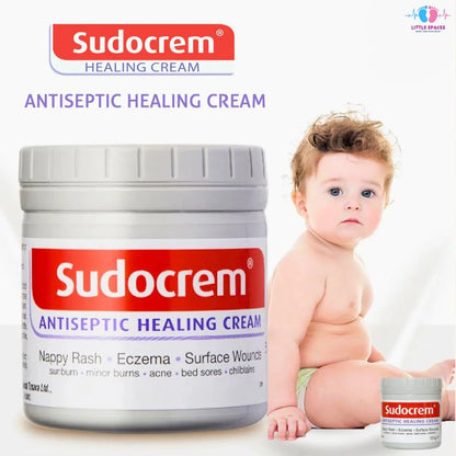 Sudocrem antiseptic healing cream jar with a child on a white background

