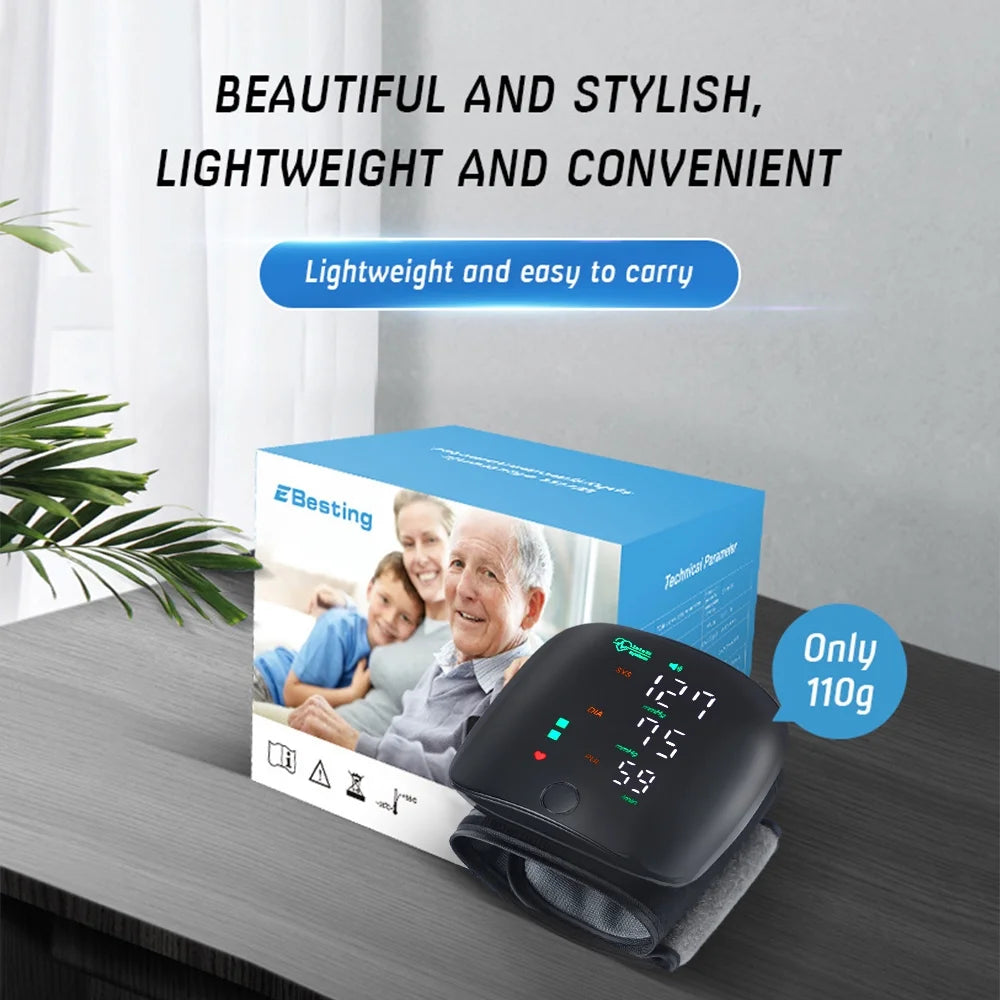 Blood pressure monitor with packaging on a table, featuring text about its lightweight and convenience.

