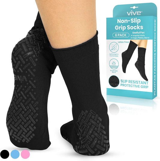 Black non-slip grip socks with packaging on a white background