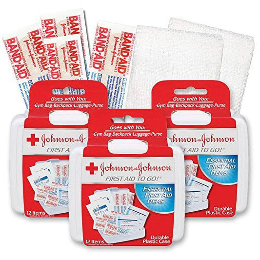 Johnson & Johnson first aid kits and band-aids on a white background

