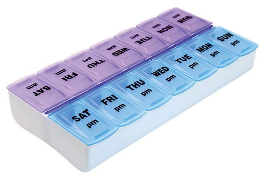 Weekly pill organizer with compartments for each day of the week.

