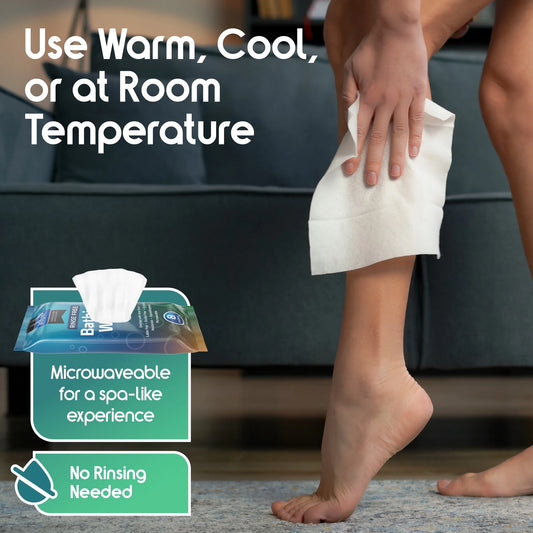 Person using a bath wipe with text on temperature instructions and product features.