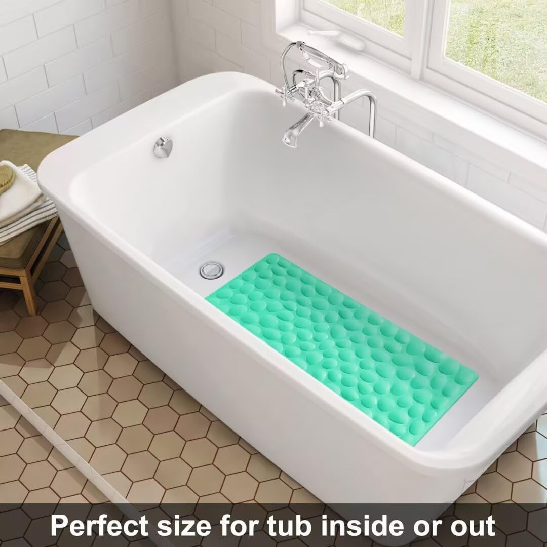 Green bath mat on a white bathtub in a bathroom setting
