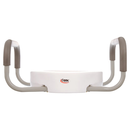 Carex raised toilet seat with 3.5-inch boost and removable padded handles. Fits standard elongated toilets and supports up to 250 lbs.