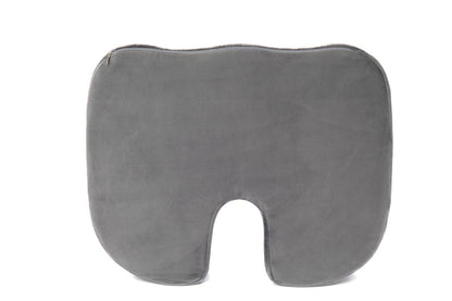 Gray cushion with a unique shape on a white background

