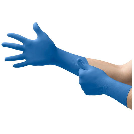 Blue gloves being worn on a white background