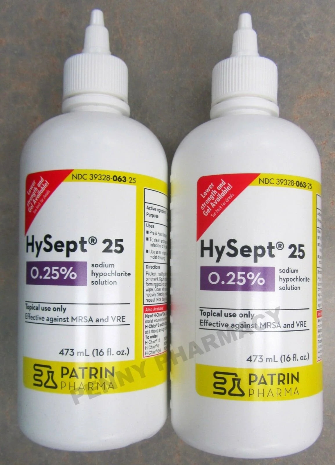 Two bottles of HySept 25 solution with visible labels on a gray background