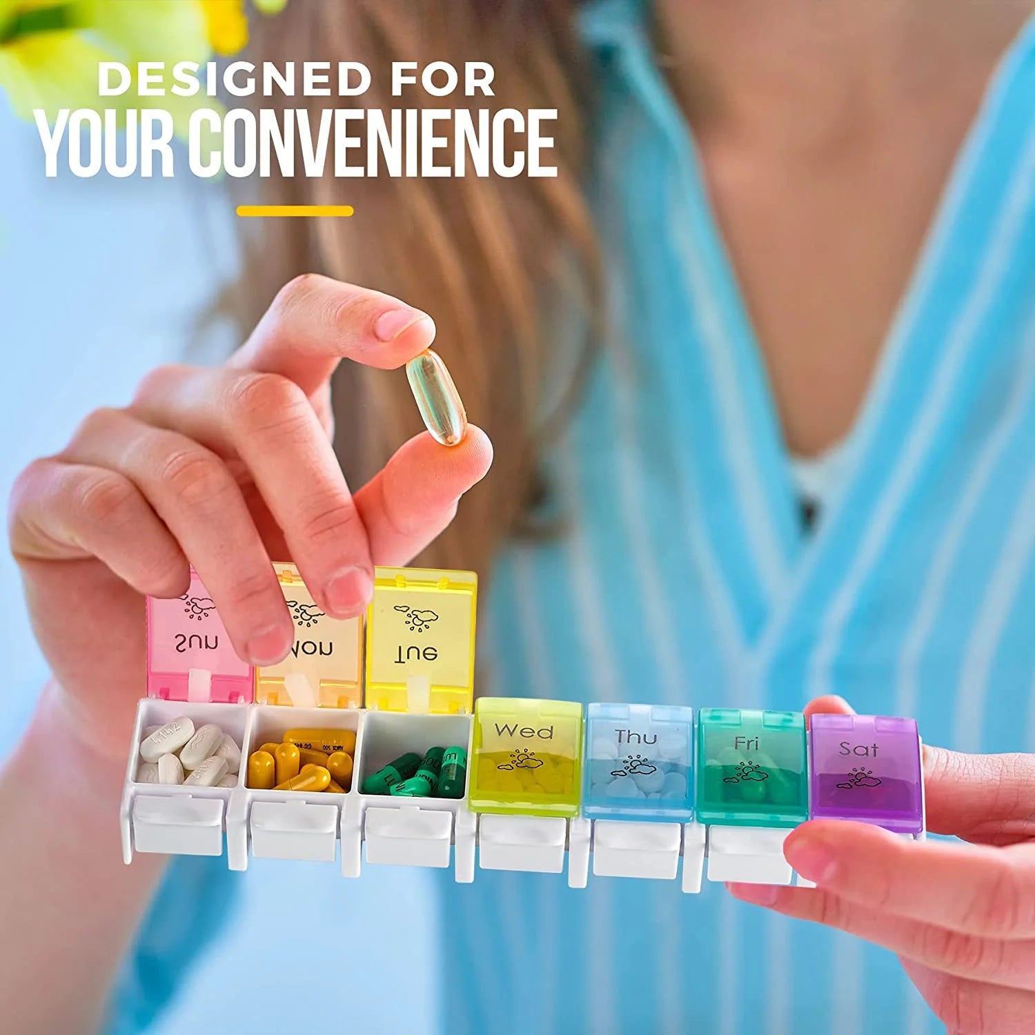 Person holding a colorful weekly pill organizer with text 'Designed for Your Convenience'.

