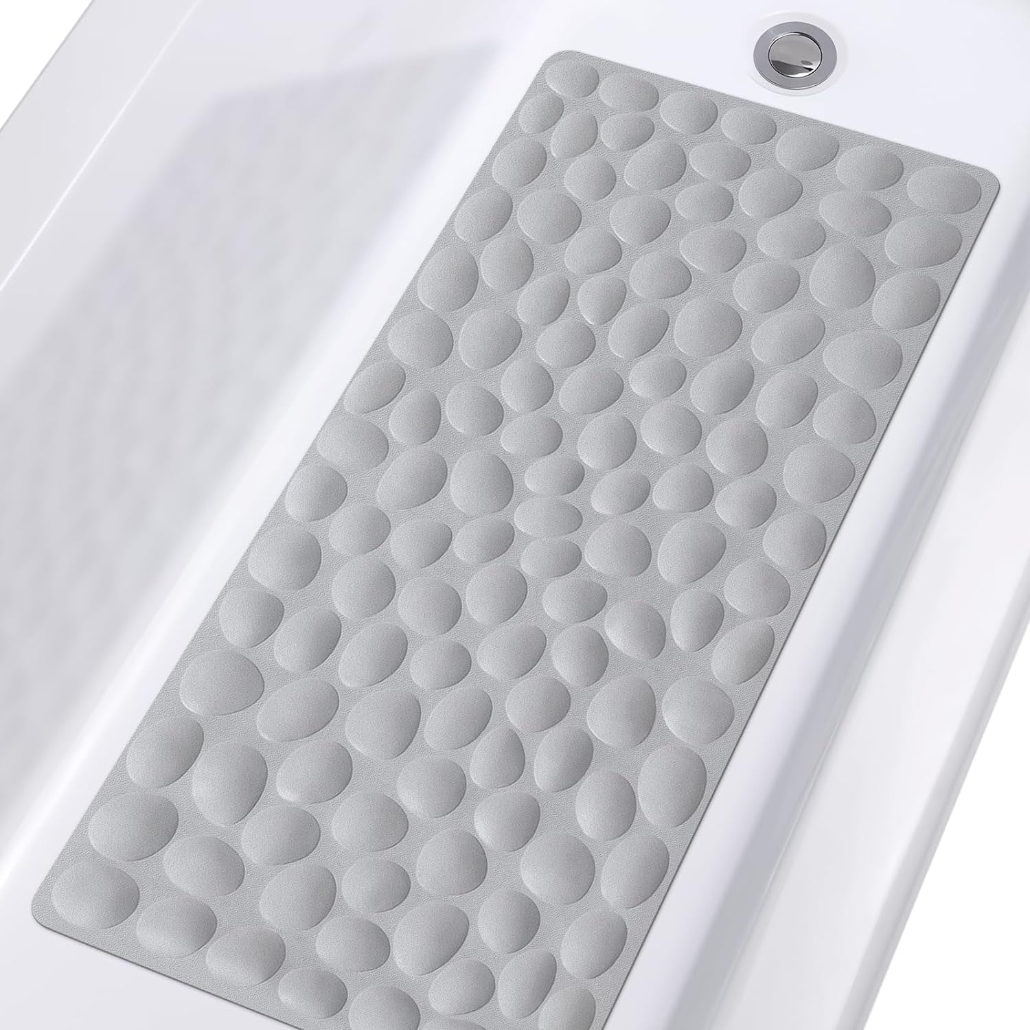 Gray textured bath mat on a white bathtub