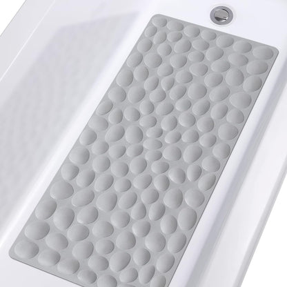 Gray textured bath mat on a white bathtub