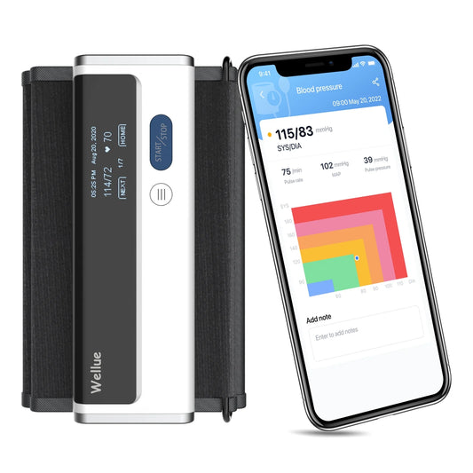 Blood pressure monitor with smartphone displaying blood pressure app on a white background

