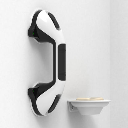White and black shower handle with soap dish on a light gray background