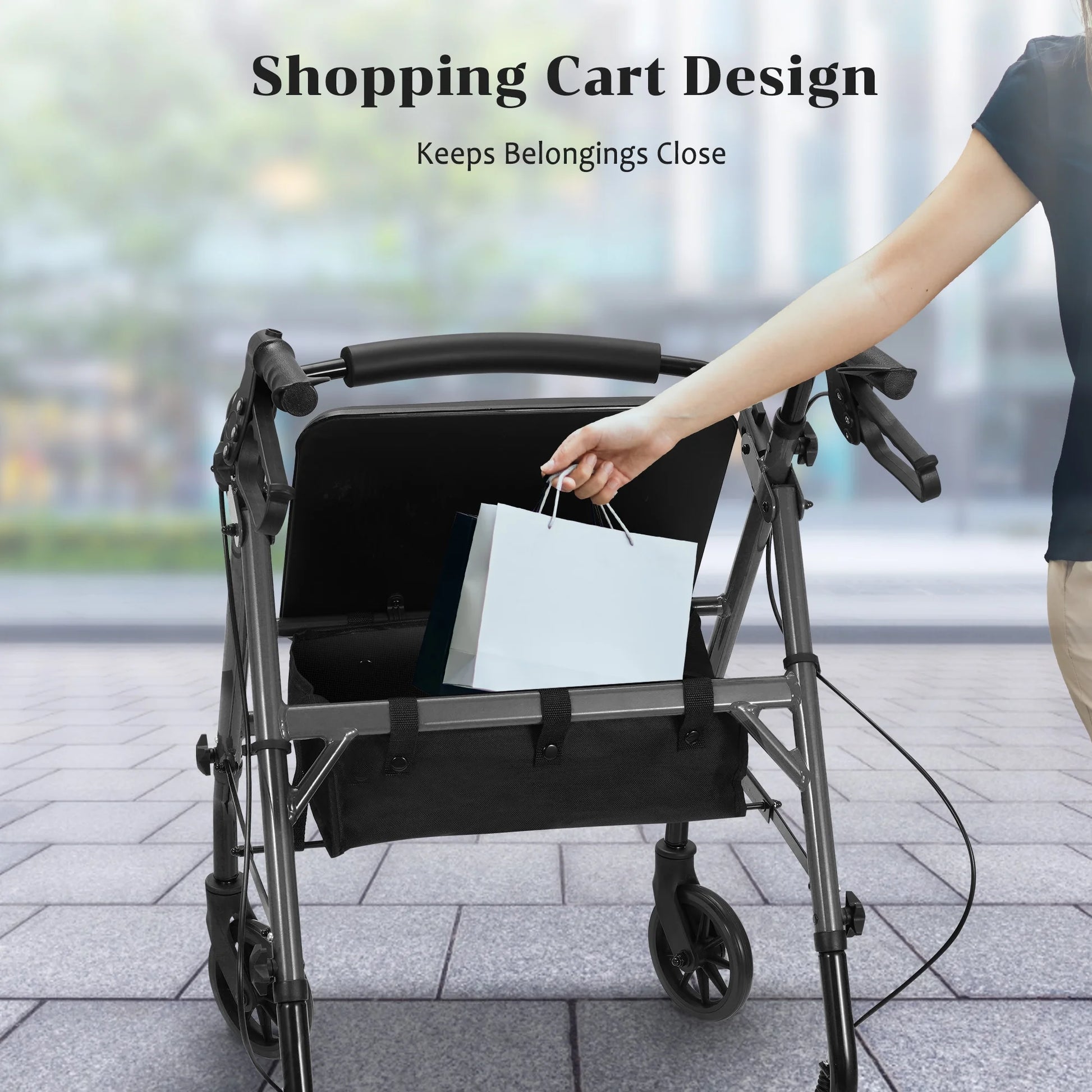 Person using a rollator with a bag attached, on a blurred street background.

