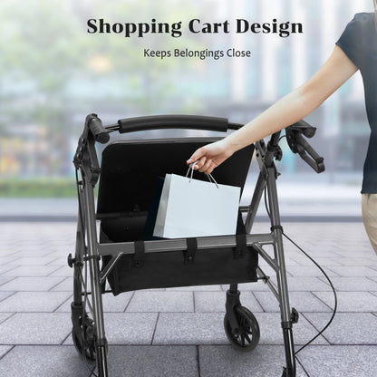 Person using a rollator with a bag attached, on a blurred street background.

