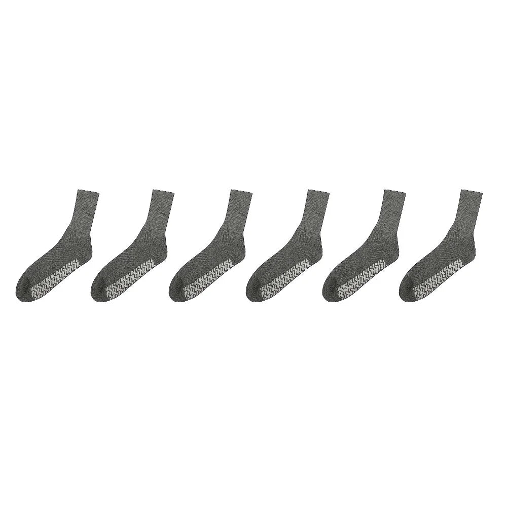 Set of six gray socks with textured sole on a white background