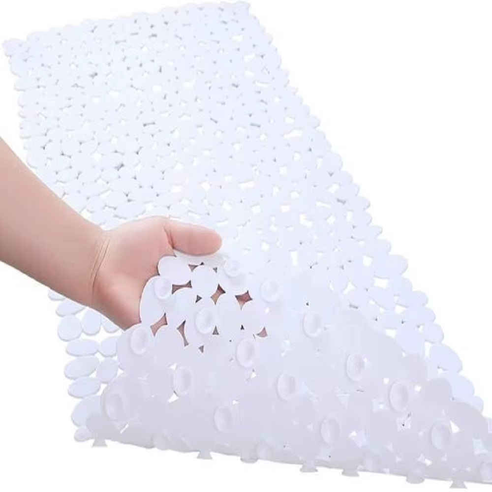 White doily held by a hand on a white background